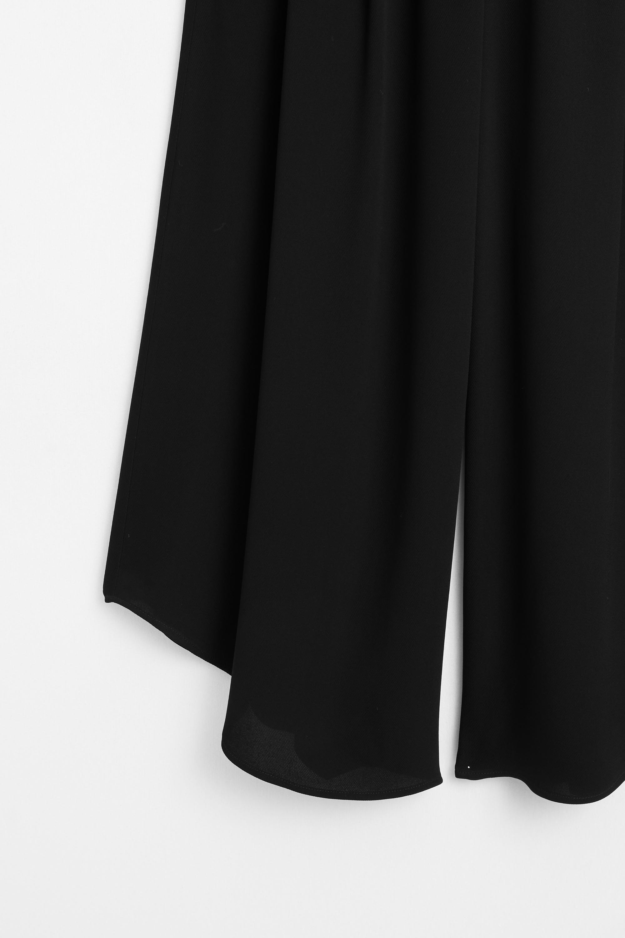 Pantalon large à plis